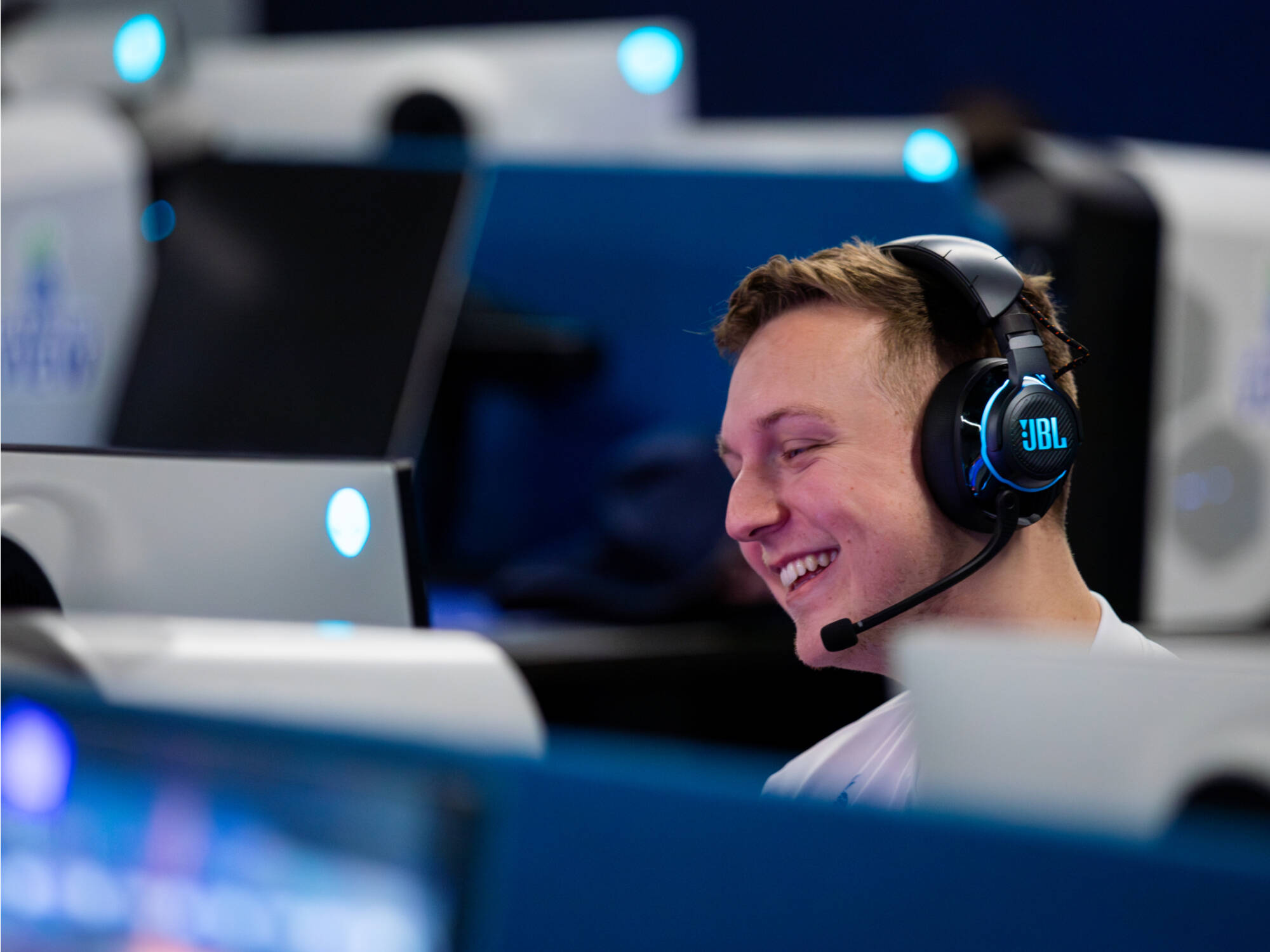 Samuel Petrarca (Leumyy) a computer science major, smiles as his team makes a big play in the rocket league tournament.
